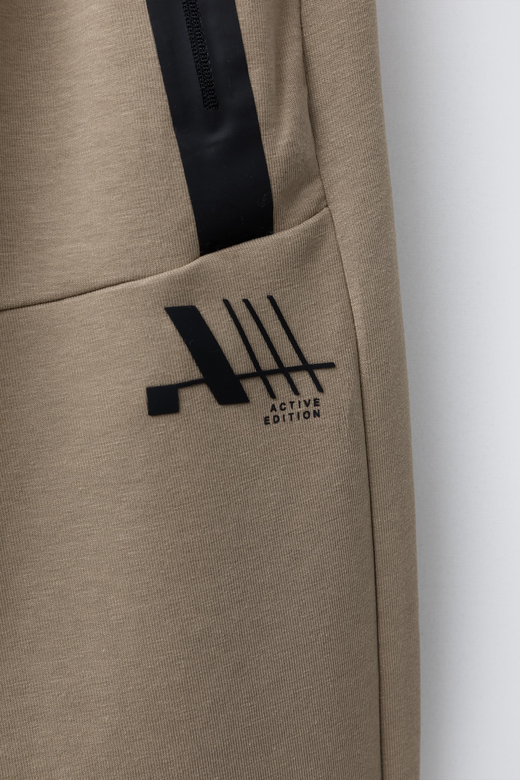 SPORTY INTERLOCK JOGGERS